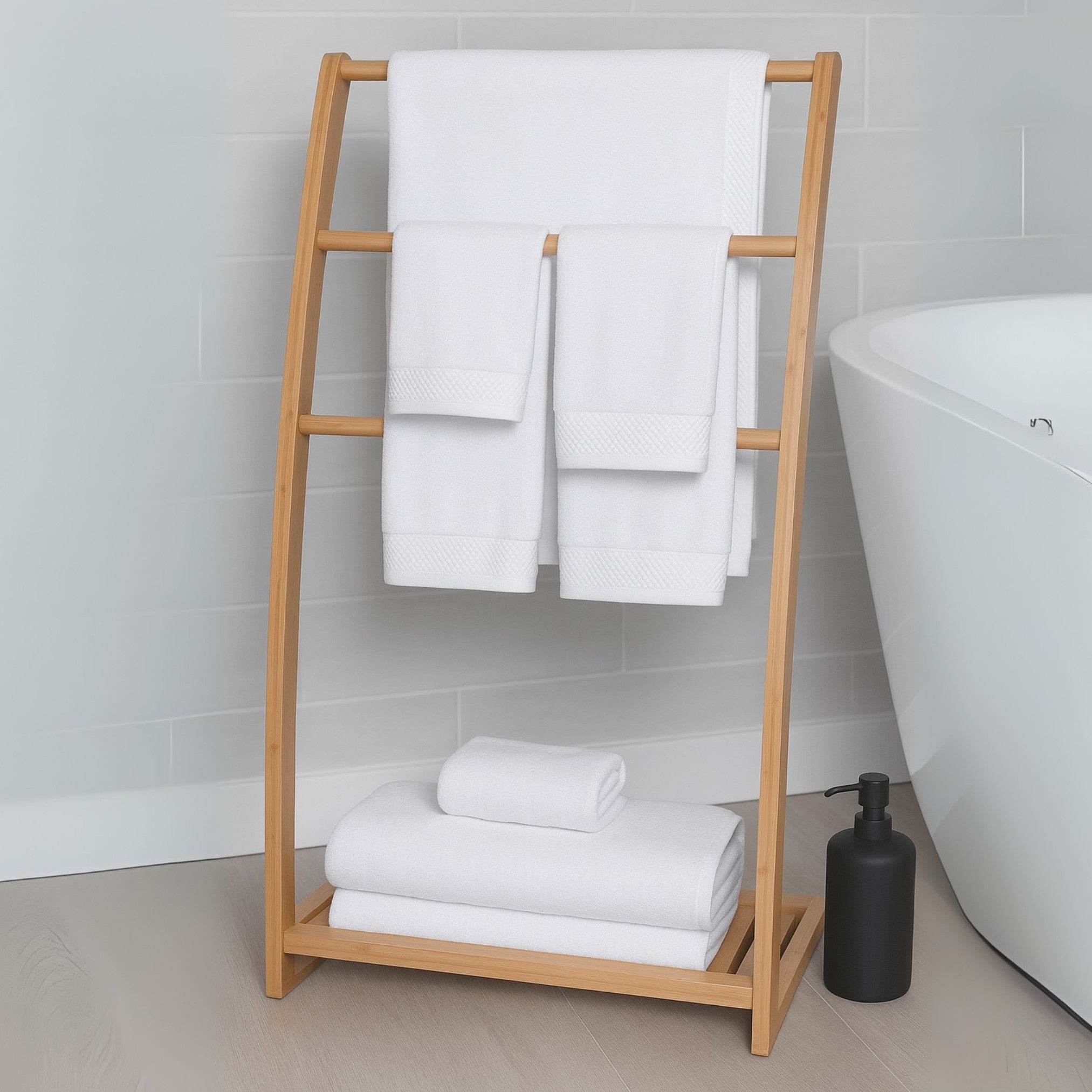 Bamboo towel rack with white towels in a bathroom setting