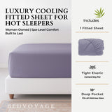 Purple fitted sheet on a bed with product features listed on the right, including '360 Tight Elastic Corners Stay Put' and '18 Deep Pocket'.