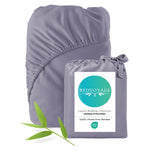 dark gray bamboo fitted sheet with Bedvoyage packaging on a white background