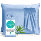 Blue bamboo pillowcases with a Bedvoyage label on a white background