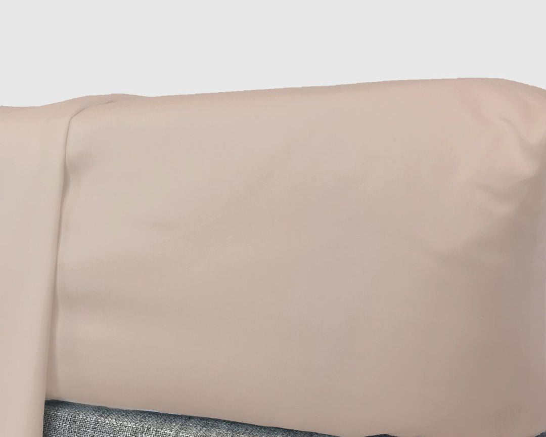 champagne beige fitted sheet on a mattress