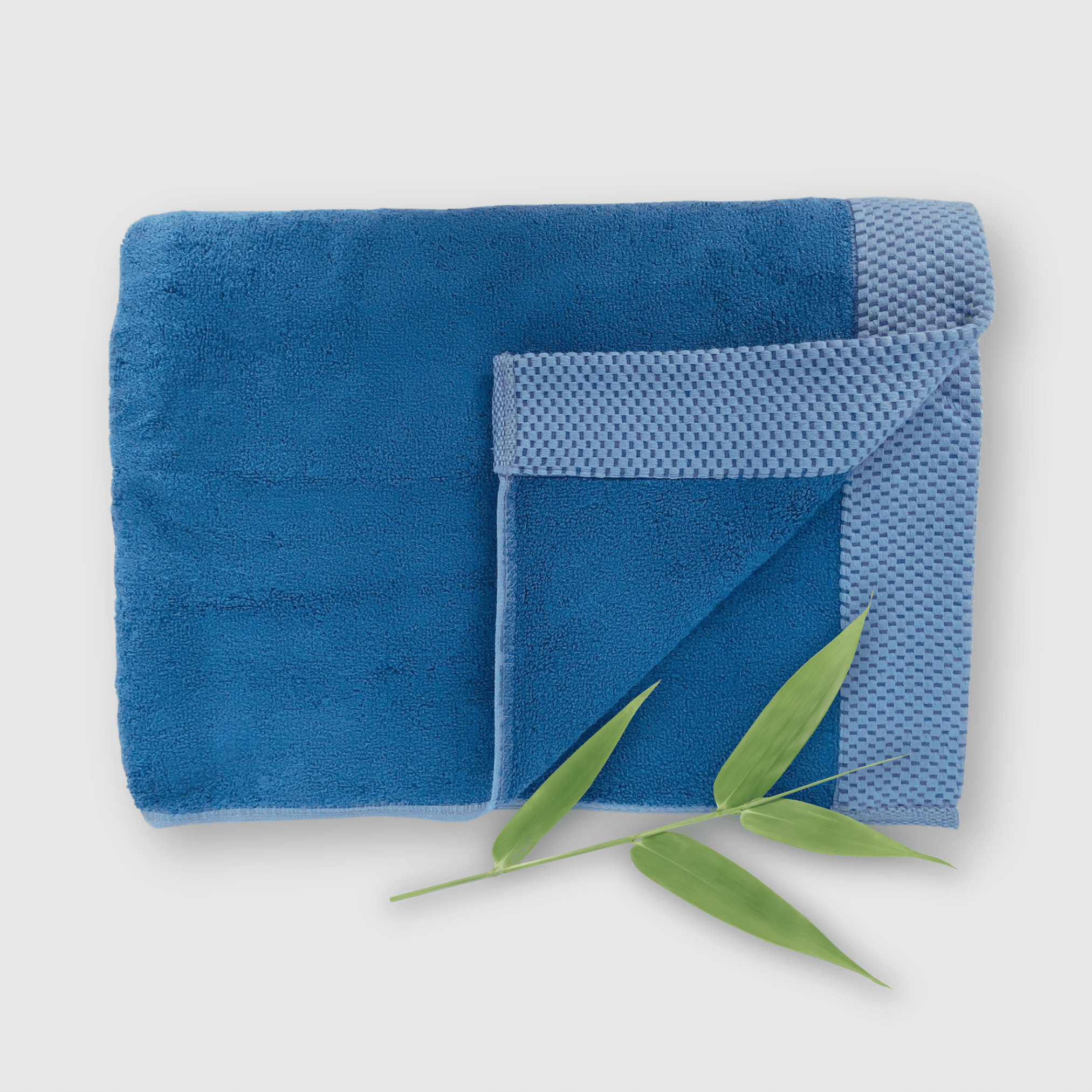 dark indigo blue luxury bamboo bath towel with basket weave edging and bamboo stalk