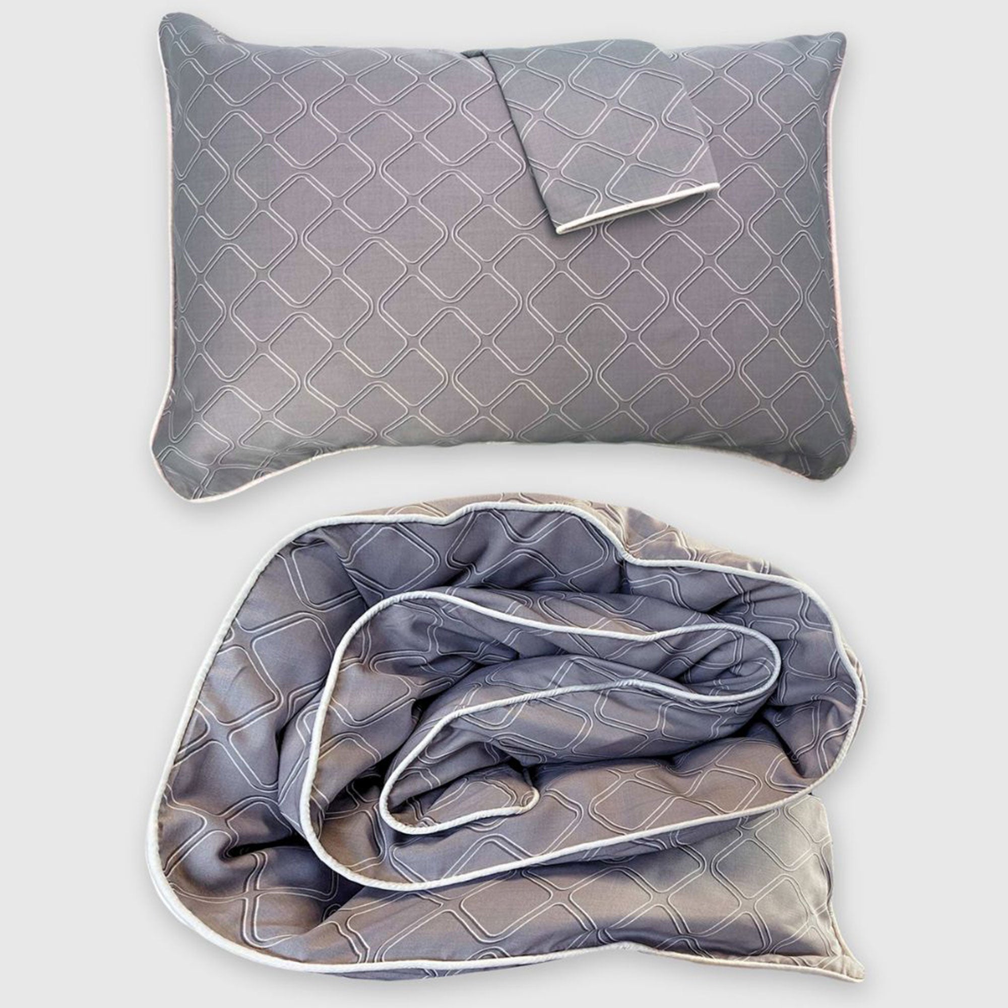 dark gray platinum and white duvet cover set with standard sham pillow floating above it