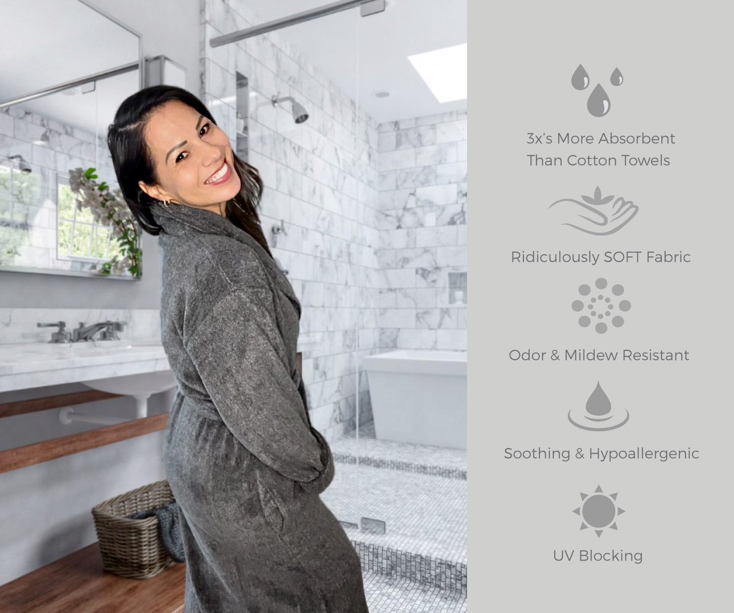 woman smiling in bathroom wearing a charcoal melange bamboo bath robe