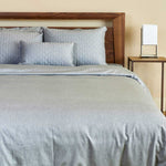 silver gray melange bamboo duvet cover on a bed looks cozy