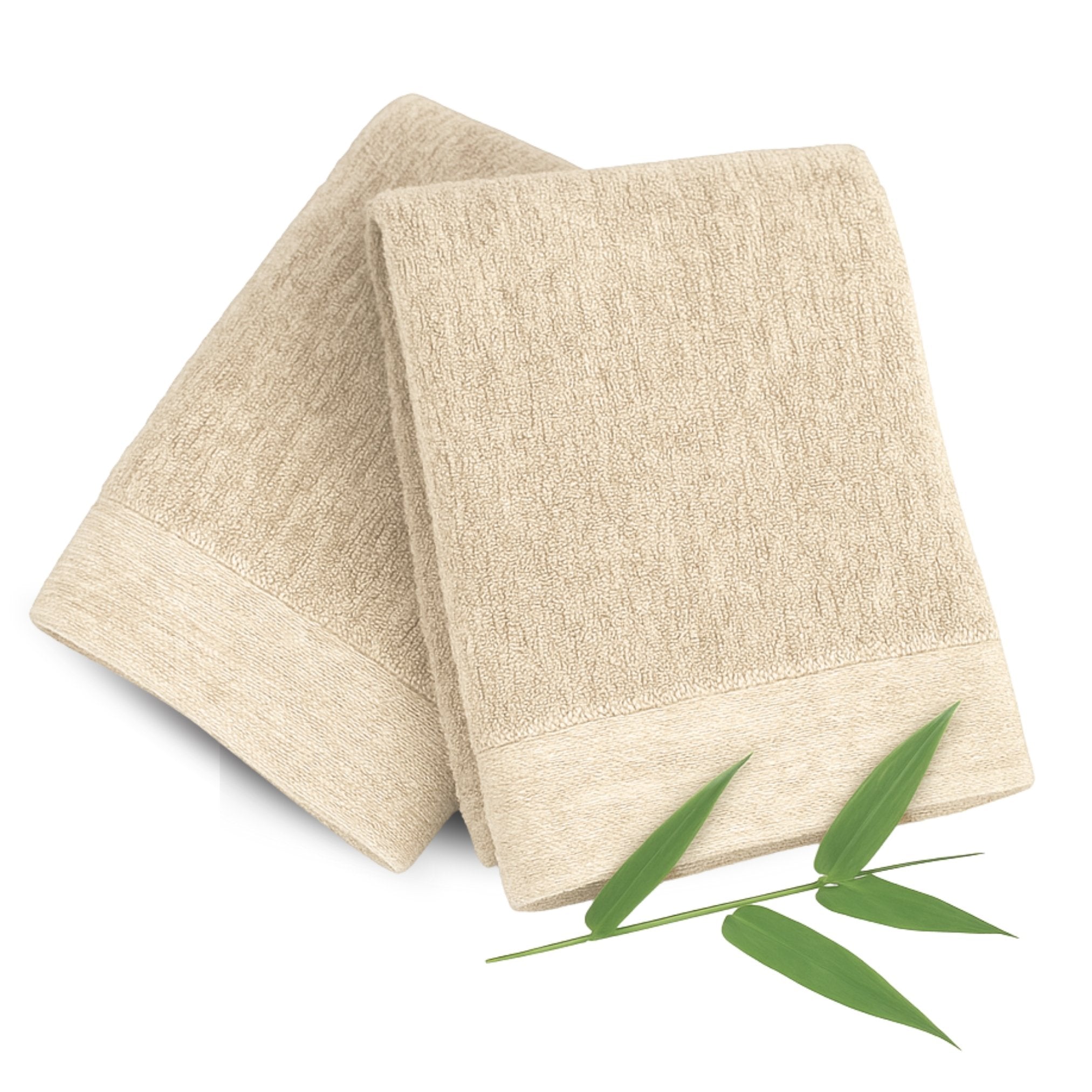Two beige towels with a bamboo leaf on a white background