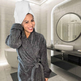 woman wearing charcoal bamboo bathrobe with hair wrapped in white bamboo towel
