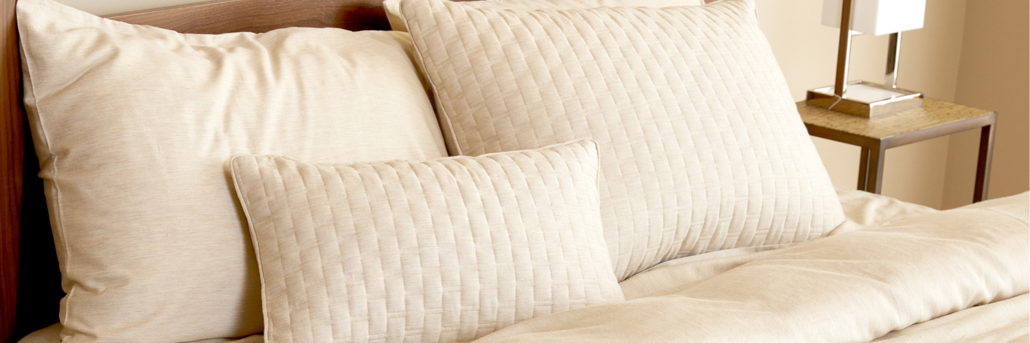 White pillows on a bed
