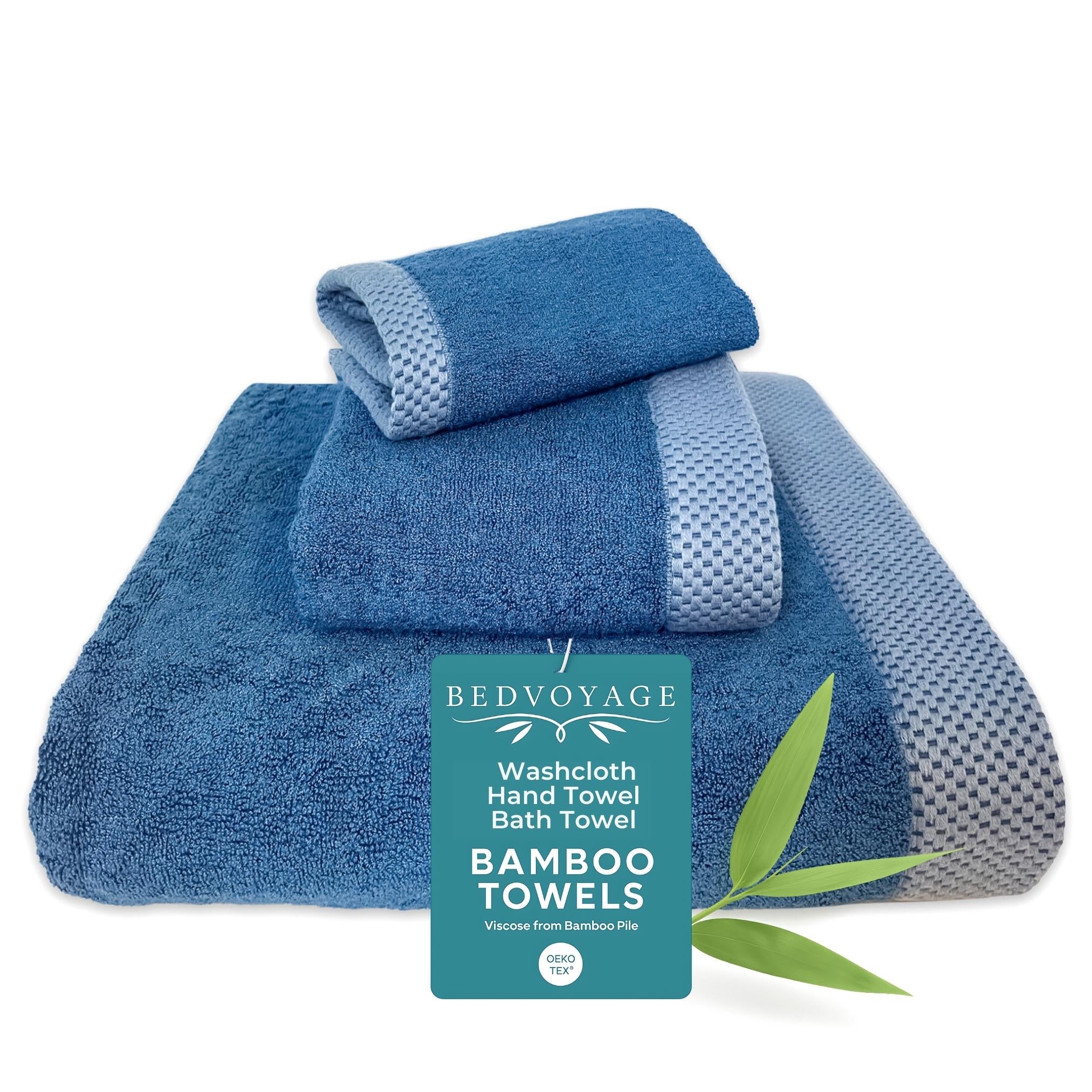Set of blue towels with a Bedvoyage label on a white background