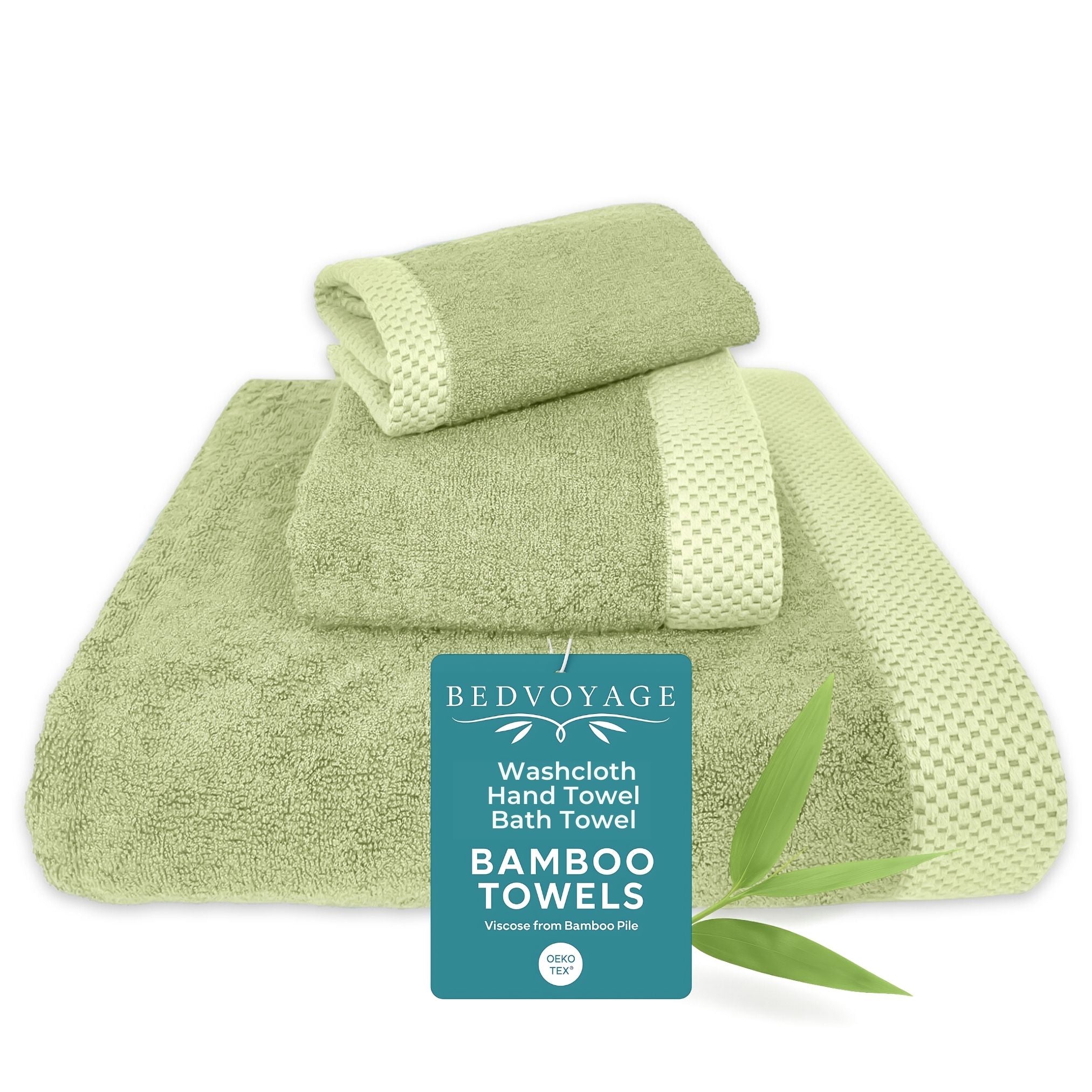 Set of green bamboo towels with a Bed Voyage tag on a white background