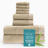 Stack of beige towels with a Bedvoyage tag on a white background
