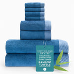 Set of blue bamboo towels with a 'Bed Voyage' tag on a white background
