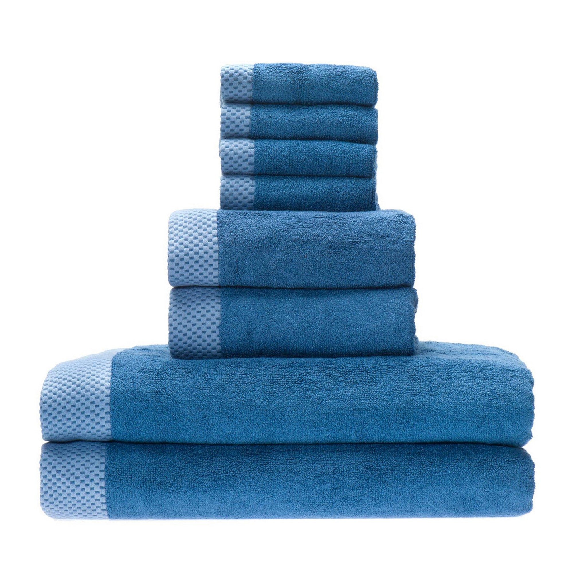 stack of dark blue indigo bamboo towels with bath hand and washcloths