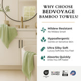Bathroom setting with green towels and Bedvoyage bamboo towels promotional text.