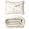 Folded duvet cover and pillow with floral pattern on a white background