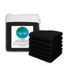 Set of black facial washcloths with a white container labeled 'Bed Voyage' on a white background