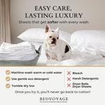 Dog on a bed with white sheets and text about easy care and lasting luxury bedding, featuring Bedvoyage brand.