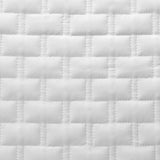 closeup of white quilted bamboo fabric swatch