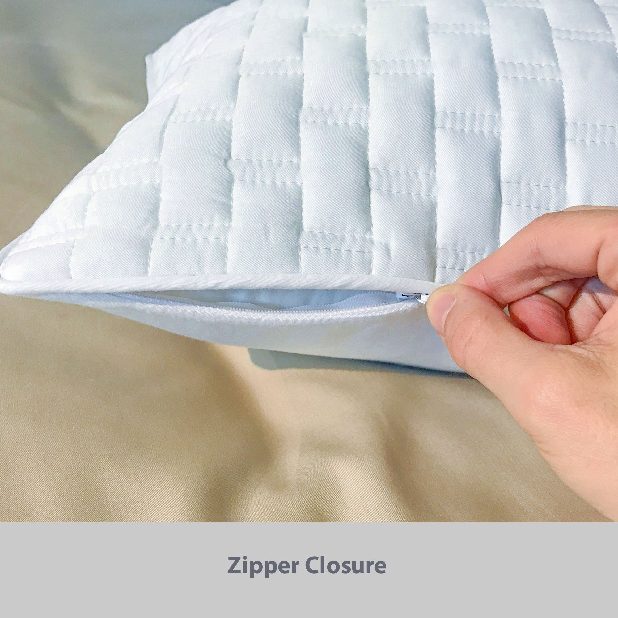 womans hand unzipping a quilted bamboo sham cover