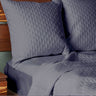 platinum gray quilted bamboo euro shams brick pattern on an elegant bed