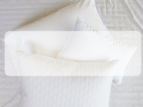 luxury white bamboo standard shams laying on a bed