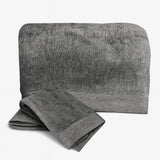 Gray towel set with folded and unfolded towel on a white background