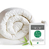 Rolled-up white bamboo cotton duvet cover with 'Bed Voyage' packaging on a white background