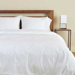 white snow melange bamboo duvet cover on bed with pillows
