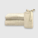 beige sand melange bamboo pillowcase stack with linen storage bag