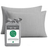 Gray bamboo pillowcases with a Bedvoyage packaging label on a white background
