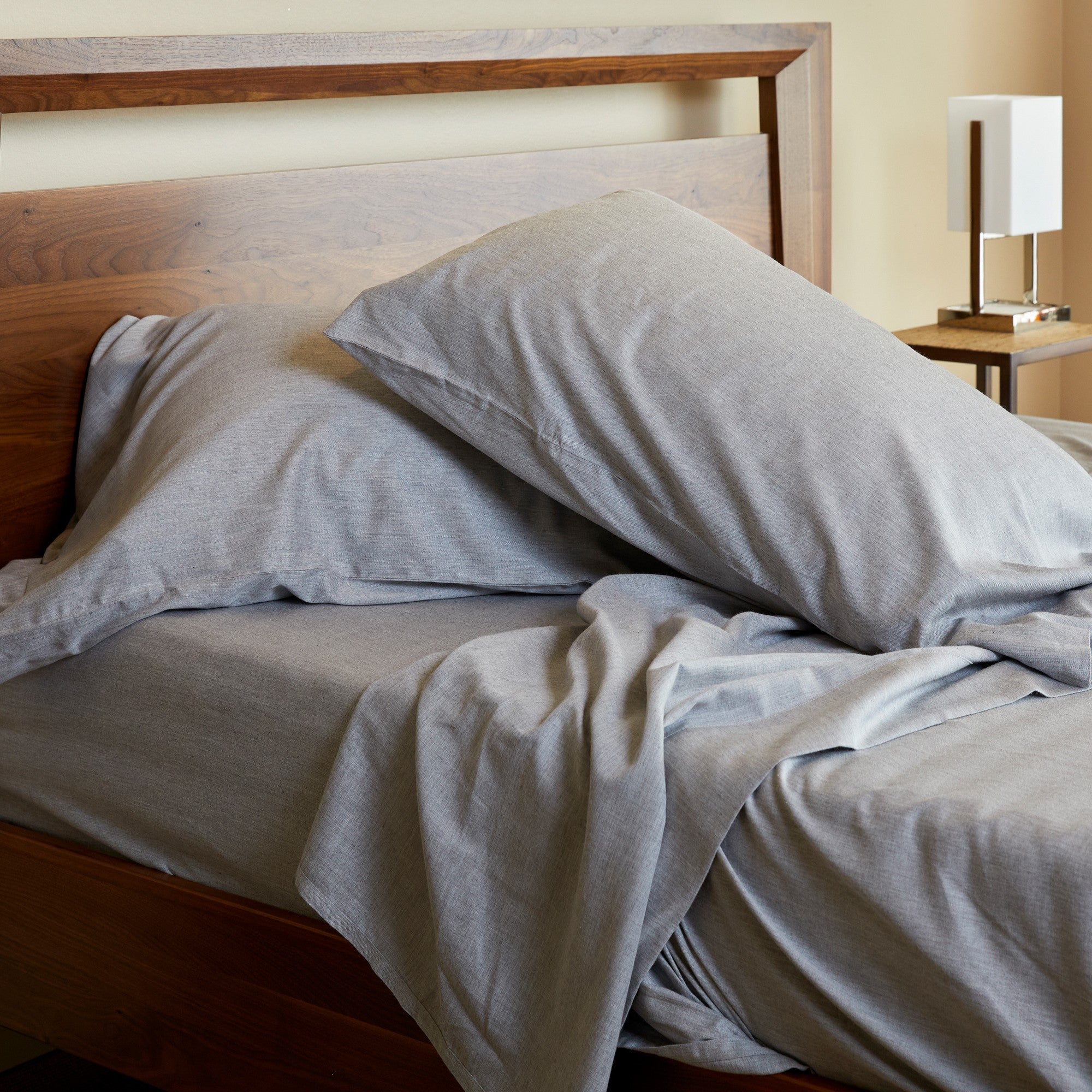 silver gray melange bamboo pillowcase set of 2 pillows on a bed