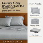 Bedroom scene with gray bamboo cotton sheet set on a bed, featuring 'Bed Voyage' branding.