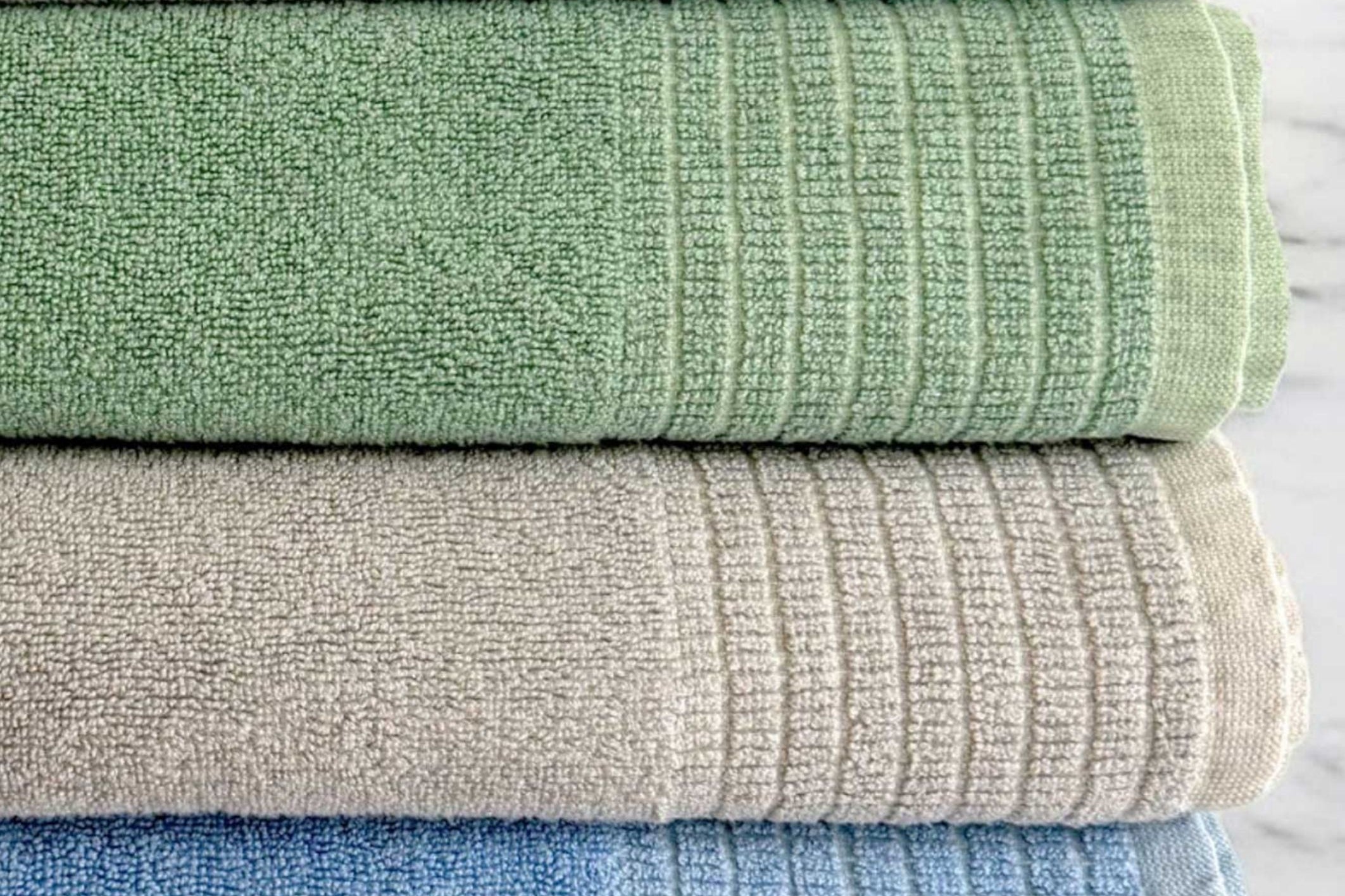 stack of bamboo towels, showing all color options